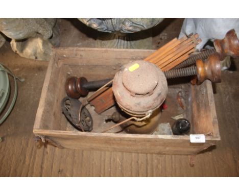A wooden box containing a Paraffin lamp; an easel etc. 