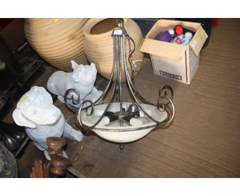 A metal and glass ceiling light 
