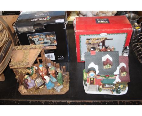 A Nativity set; together with a light up cafe 