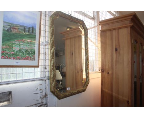 An octagonal bevel edge wall mirror