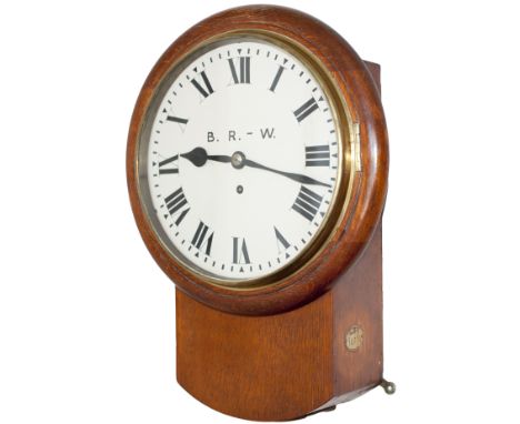 Somerset and Dorset Railway 10-inch oak cased iron dial railway clock with a spun brass bezel supplied by one of the Midland 