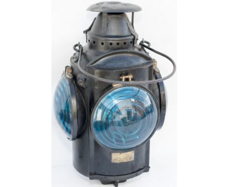 Canadian Railway crossing lamp complete with four blue Bulls-eye lenses, reservoir and burner. Embossed in the top HLPM and b