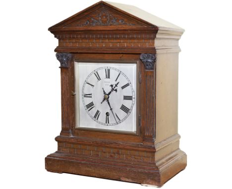 North Eastern Railway 6 inch Gothic Style Oak cased silvered dial railway clock in a bracket style case with a rectangular ca