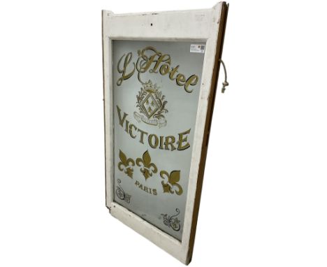 20th century white painted pine sash window, decoration with later painted hotel adverting 'L'Hôtel Victoire, Paris'Dimension