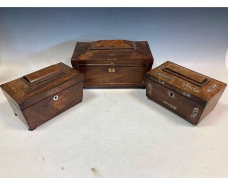 A Regency mother of pearl inlaid tea caddy 14 x 22 x 13cm together with two other 19th century sarcophagus shaped caddys (3)P