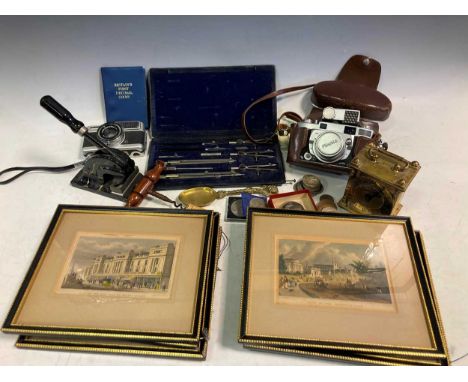 Small decorative London scene prints, a Victorian corkscrew, 1950s/60s Minolta 35mm camera, a few coins, with an umbrella sta