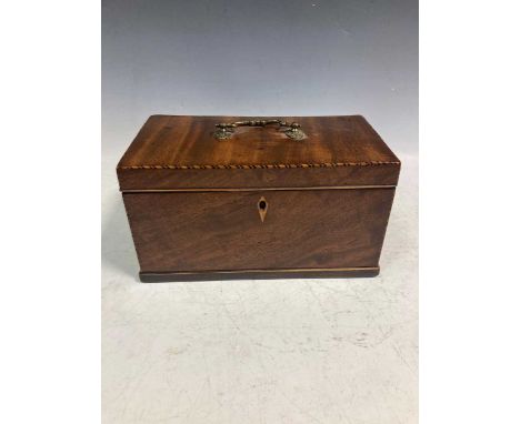 A George III mahogany tea caddy, the hinged lid with brass handle enclosing a three division interior, 14 x 25 x 13.5cmProven