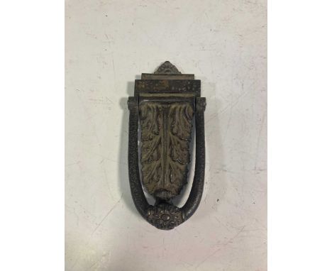 A Kenrich &amp; Sons cast iron door knocker, 19cm highProvenance:Property of a collector, removed from Moggerhanger Park, Bed