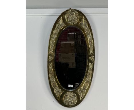 with Celtic knots against hammered grounds in relief 41cm x 85.5cm overall   Mirror is in overall good condition. Exterior br