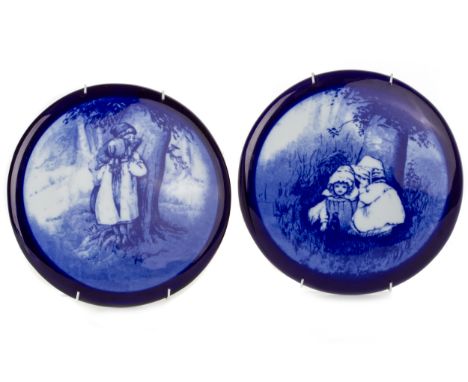 each of circular form, depicting children playing in woodland settings, with blue stamped marks on reverse 18.5cm diameter an