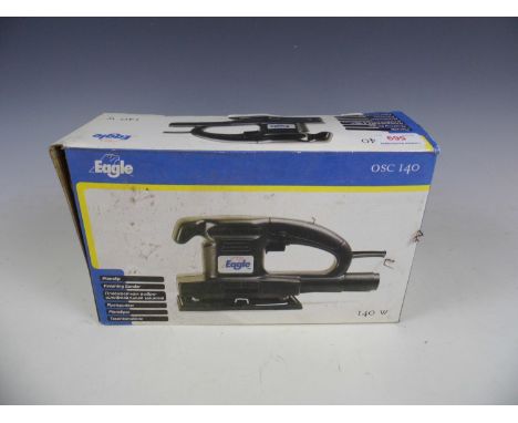 A boxed Eagle finishing sander