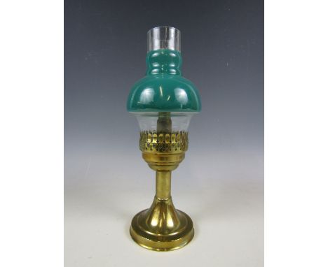 A brass candle lamp