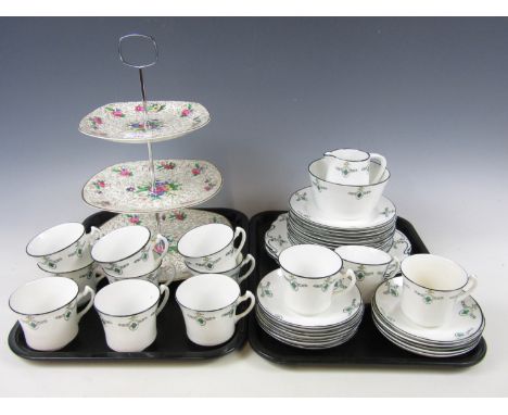 A quantity of Wellington china tea wares together with a Midwinter cake stand
