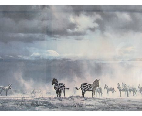 After David Shepherd (1931 - ) CBE Storm Over Amboseli, offset lithograph, framed and mounted under glass, 50 x 76 cm