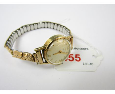 A mis 20th Century lady's 14ct gold cased Tissot wristlet watch
