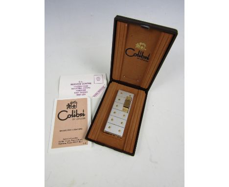 A cased Colibri of London Molectric lighter  