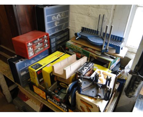 Collection of woodworking tools to include mitre saws, clamps, sanders, jigsaw, G-clamps and 4 plastic cases for screws, etc.
