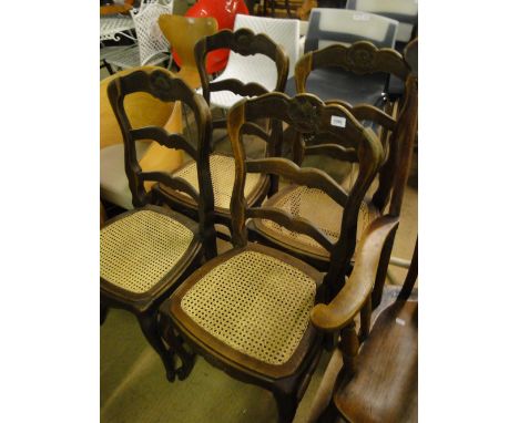 A set of 4 French ladder back and cane seated dining chairs.