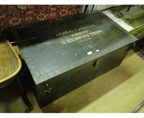 A Vintage stained pine and steel bound trunk, the top marked Major H L E Morley AC, 0902319, "To Accompany Troops."
