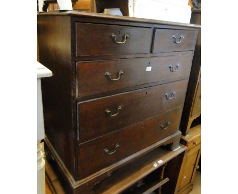 A George III oak chest of 2 short and 3 long drawers, bracket feet, width 3'1", height 3'3", depth 1'8".