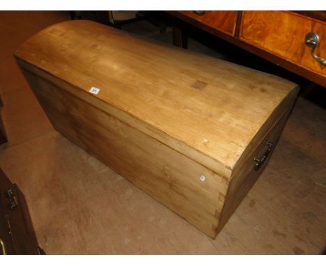 A continental domed top waxed pine trunk.