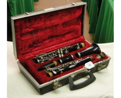 A cased Boosey & Hawkes clarinet.