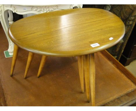 A nest of 3 Ercol occasional tables.