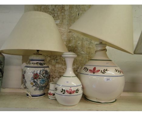 A large Iden Pottery table lamp, decanter and mug and another table lamp and shade.