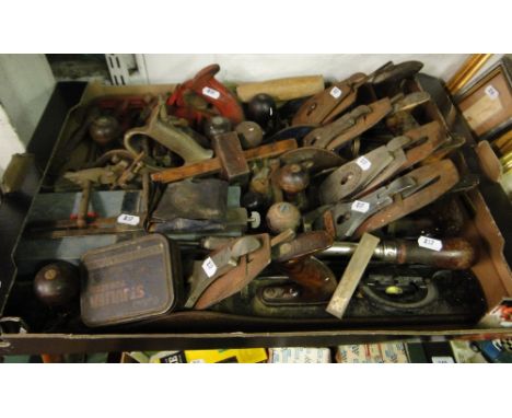 A box of carpentry tools including Stanley & Record planes.