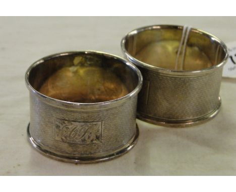 Pair of early 20th century engine turned silver napkin rings, Birmingham 1902, makers marks B & Co.