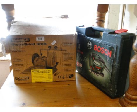 A Tormek grinder and a Bosch jigsaw.