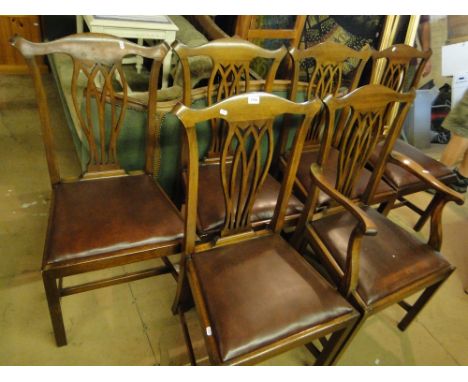 A set of 6 mahogany Chippendale design dining chairs with pierced splat backs and upholstered drop-in seats.