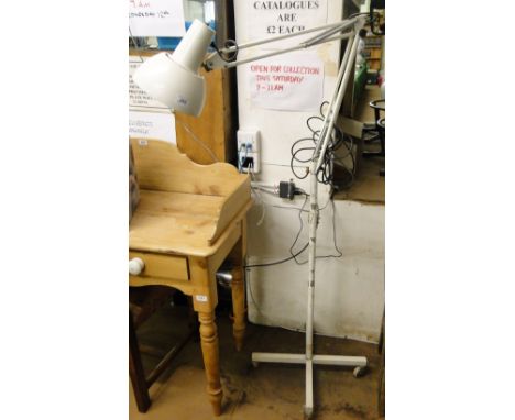 A floor standing angle-poise lamp model 82 by Herbert Terry.