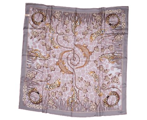 Cartier, a 100% silk Cartier Savann A Motif scarf with animal &amp; gemstone print in a mixture of beige, browns &amp; yellow