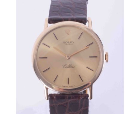 Rolex, a 18ct yellow gold gents Cellini round face manual wind wristwatch, with leather strap, also 18ct buckle, with booklet