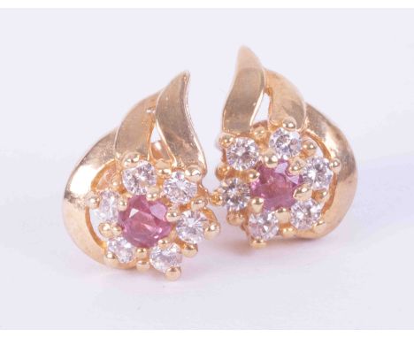 A pair of 9ct yellow gold leaf &amp; flower design earrings set approx. 0.12 carats of ruby (total weight) and approx. 0.18 c