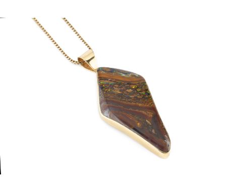 A boulder opal pendant on chain, the freeform boulder opal in 18ct gold mount, suspended from an 18ct gold fancy-link chain, 