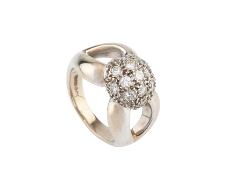 A diamond dress ring, centred with a pavé set cluster of round brilliant-cut diamonds, between shaped openwork shoulders, 18c