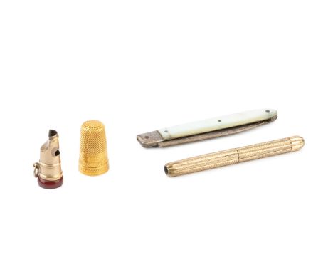 A 19th century yellow metal thimble, cased, a gold plated and hardstone novelty whistle seal, 2.5cm, a gold plated propelling