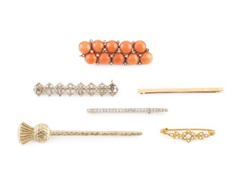 A diamond set bar brooch, millegrain set with a line of old-cut diamonds and later replaced white stones, another diamond set