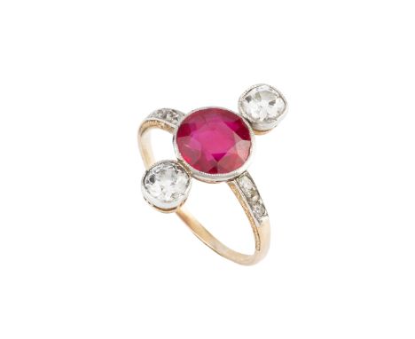 A synthetic ruby and diamond dress ring, the circular-cut synthetic ruby flanked by two old-cut diamonds in millegrain collet