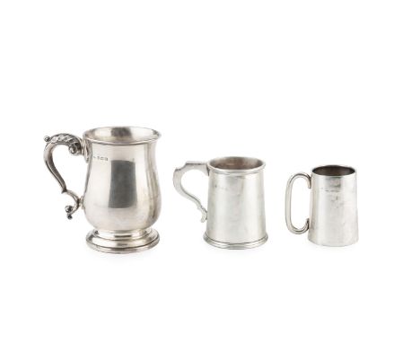 An Edward VIII silver baluster pint mug, with leaf capped scroll handle, by Turner &amp; Simpson Ltd, Birmingham 1938, 13cm h