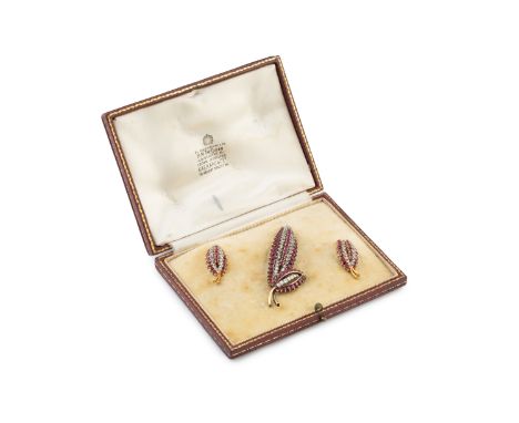 A ruby and diamond brooch and ear studs matched suite by Ben Rosenfeld, each designed as a tiered foliate spray of graduated 