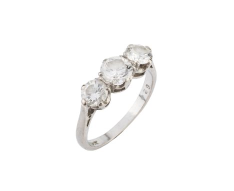 A diamond three stone ring, the graduated round brilliant-cut diamonds in claw setting, white precious metal mounted, stamped