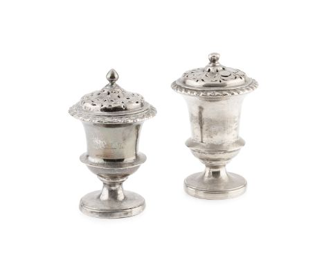 A 19th century Indian colonial silver pepper, of urn form with gadrooned border and pierced cover, 9cm high, and a similar sa
