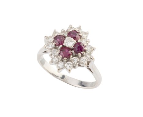 A ruby and diamond cluster ring, designed as a lozenge-shaped cluster of round brilliant and single-cut diamonds, spaced by f