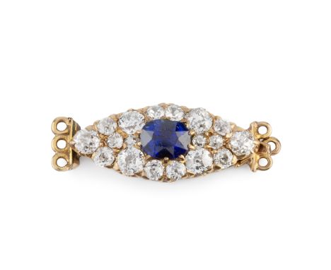 A sapphire and diamond clasp, designed as a navette-shaped cluster of graduated old-cut diamonds, enclosing a cushion-shaped 