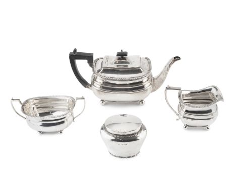 A silver three piece tea service, with gadrooned borders, the teapot with ebonised handle and knop, by Dixon &amp; Sons, Shef
