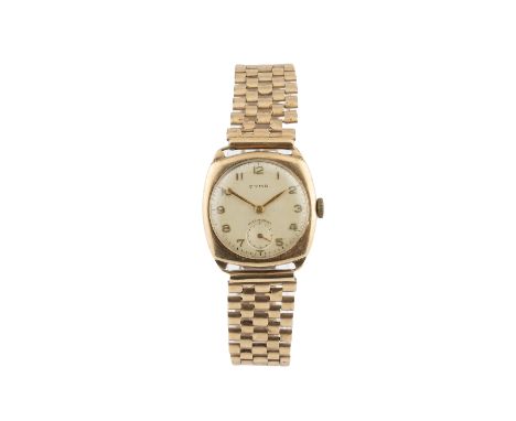 A 9ct gold bracelet watch, the circular dial with gilt Arabic numerals and subsidiary seconds dial, to a jewelled manual wind