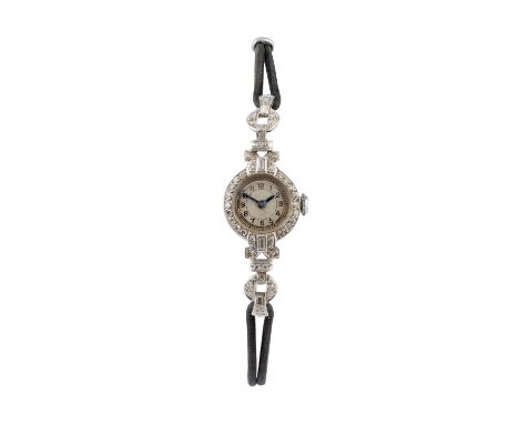 A diamond cocktail watch, the circular silvered dial with black Arabic numerals, to a manual wind movement, the case and open